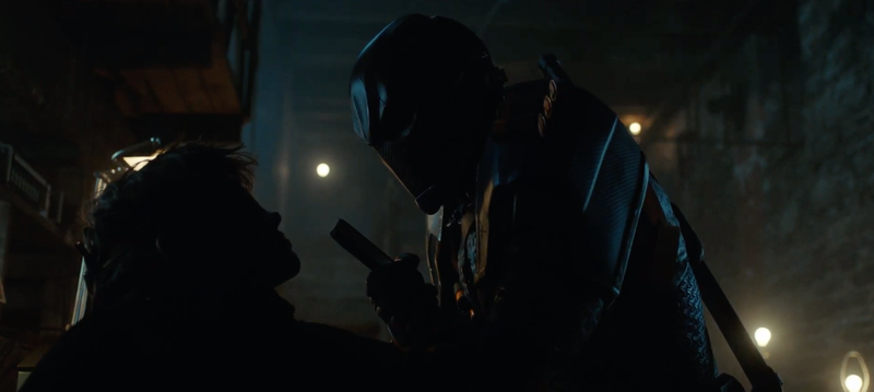 Deathstroke torturing Jason.